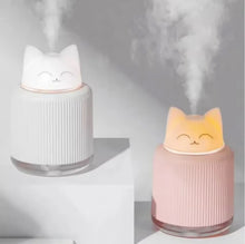 Cute cat-shaped portable mini humidifier with soft night light glow, compact size 