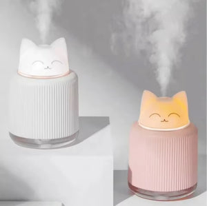 Cute cat-shaped portable mini humidifier with soft night light glow, compact size 