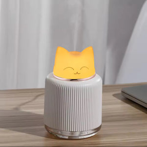 Cute cat-shaped portable mini humidifier with soft night light glow, compact size 